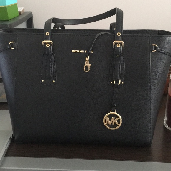Handbags - Michael Kors black purse.